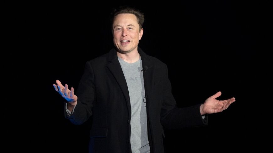 Elon Musk gestures as he speaks during a press conference at SpaceX's Starbase facility near Boca Chica Village in South Texas on Feb. 10, 2022. 