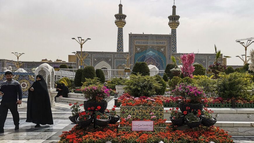 Iranians visit the spot in the courtyard of Imam Reza shrine in the northeastern city of Mashhad on April 6, 2022.