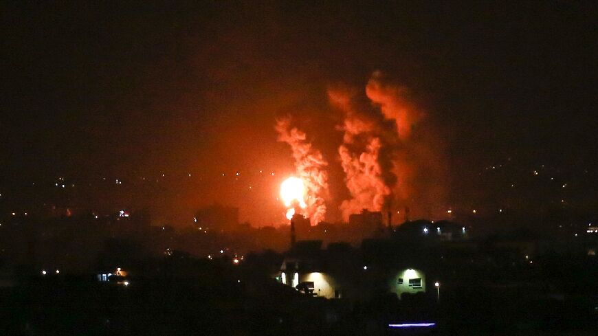 Flames and smoke rise over the central Gaza Strip as Israeli warplanes retaliate against rocket fire into southern Israel in the biggest escalation in months