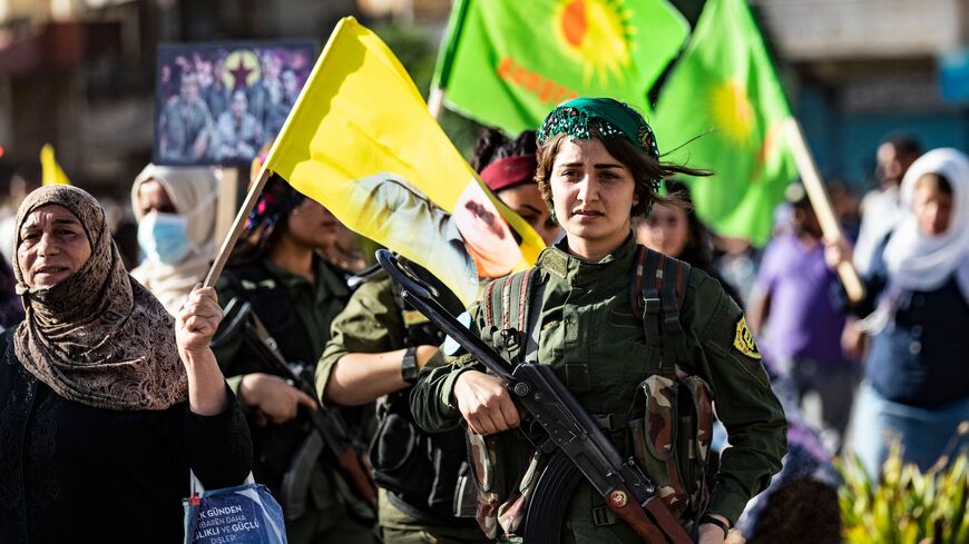 Syrian Kurds demonstrate on June 10, 2021, in the northeastern Syrian city of Qamishli.