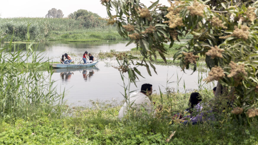 Coptic Christian families celebrate the Spring Festival known as Sham el-Nessim by the Nile banks in al-Barsha village, Egypt, April 25, 2022.