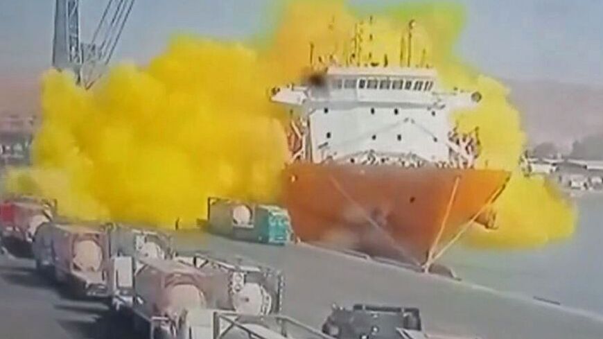 Footage on state TV showed a large cylinder plunging from a crane on a moored vessel, causing a violent explosion of yellow gas in Jordan's Aqaba port 