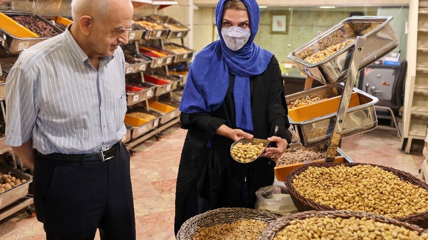 Iranian pistachio wholesaler Abbas Emami and his daughter Marjan