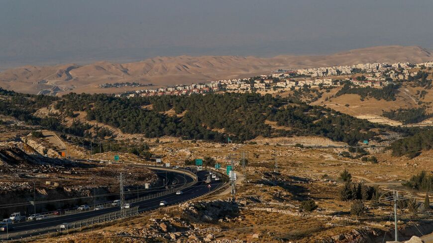 A picture taken from the E1 corridor, a super-sensitive area of the occupied West Bank, shows the Israeli settlement of Maale Adumim in the background on June 30, 2020. 