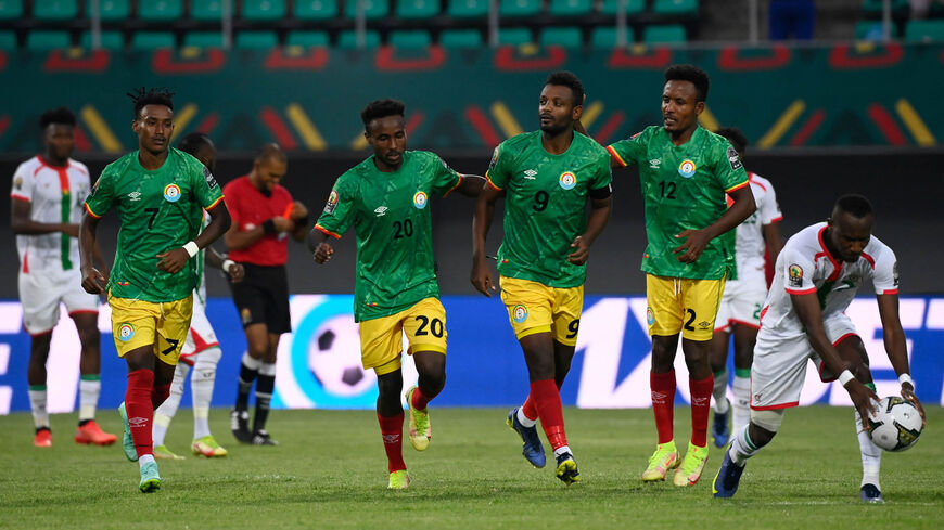 Ethiopia's midfielder Surafel Dagnachew, defender Ramadan Yusef, forward Getaneh Kebede and midfielder Yehun Endeshaw run on the field during the Group A Africa Cup of Nations 2021 soccer match between Burkina Faso and Ethiopia, Kouekong Stadium, Bafoussam, Cameroon, Jan. 17, 2022.