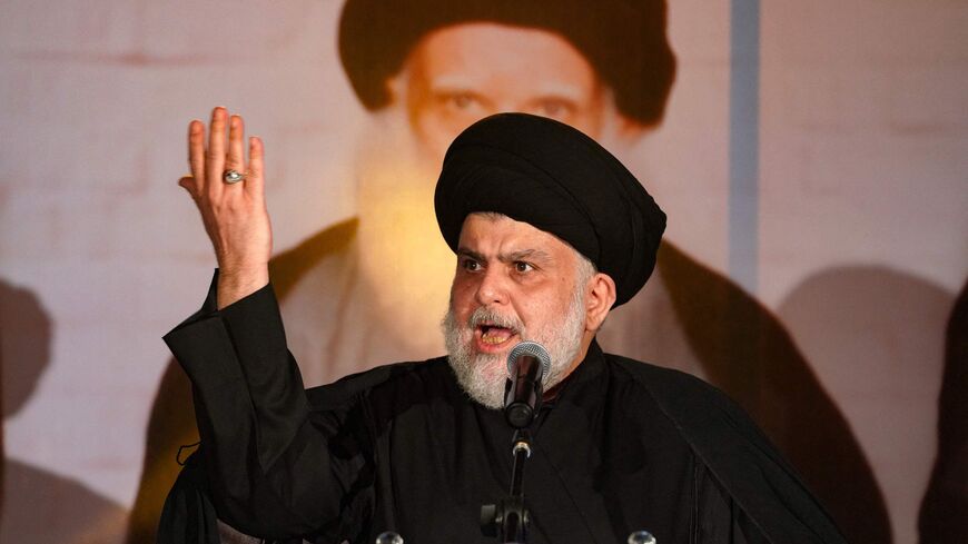 Iraqi Shiite cleric Muqtada al-Sadr delivers a speech in the central Iraqi city of Najaf on June 3, 2022.