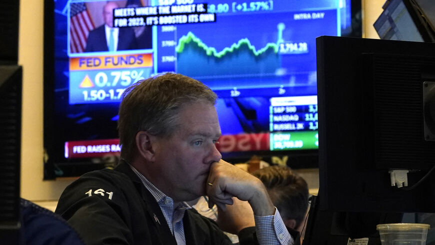 Traders work on the floor of the New York Stock Exchange on June 15, 2022.