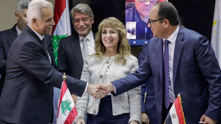 (L to R) Director-General of Syria's General Petroleum Corporation Nabih Khrestin.