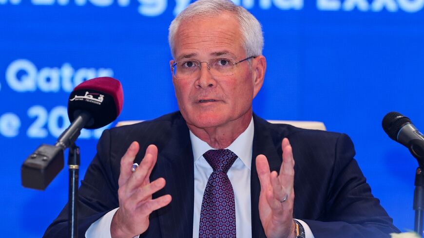 Exxon Mobil Corporation's Chairman and CEO Darren Woods speaks during a press conference and signing ceremony at QatarEnergy headquarters in Doha, on June 21, 2022