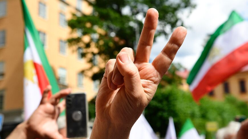 Protesters cheered and waved flags outside the courthouse after the verdict Thursday 