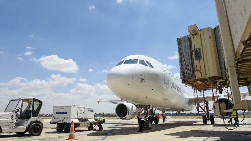 A Cham Wings Airbus A320-211 pictured at Syria's Aleppo airport