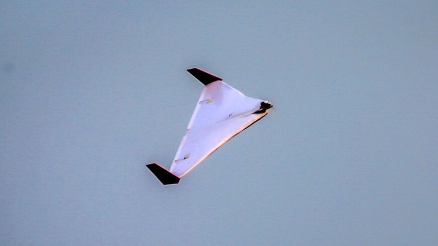 An Iranian unmanned aerial vehicle (UAV) or drone flies during Iranian military exercises in 2020 near sensitive Gulf waters in the Strait of Hormuz 