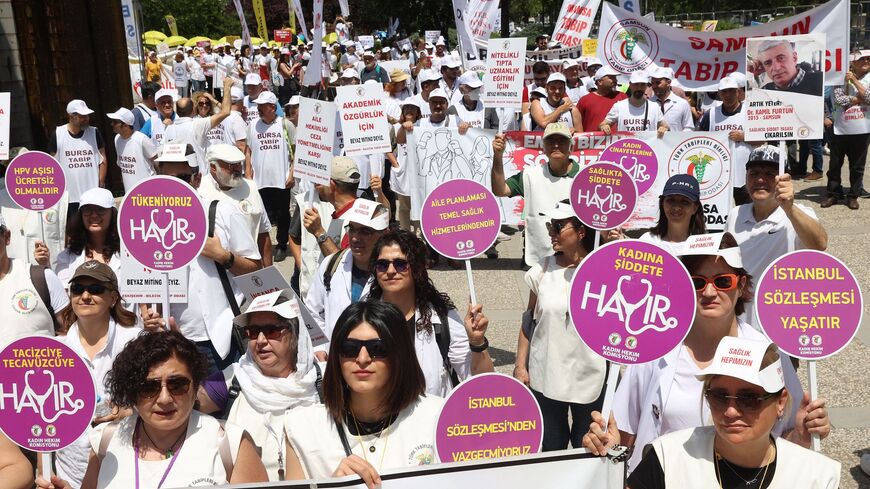 Health care workers protest, calling on the government to improve working conditions in Ankara, on May 29, 2022. 