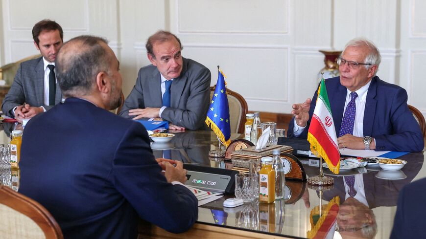 Iran's Foreign Minister Hossein Amir-Abdollahian (L) meets Josep Borell, the High Representative of the European Union for Foreign Affairs and Security Policy (R), as Deputy Secretary General of the European External Action Service (EEAS) Enrique Mora (C) looks on, at the foreign ministry headquarters in Iran's capital Tehran on June 25, 2022.  