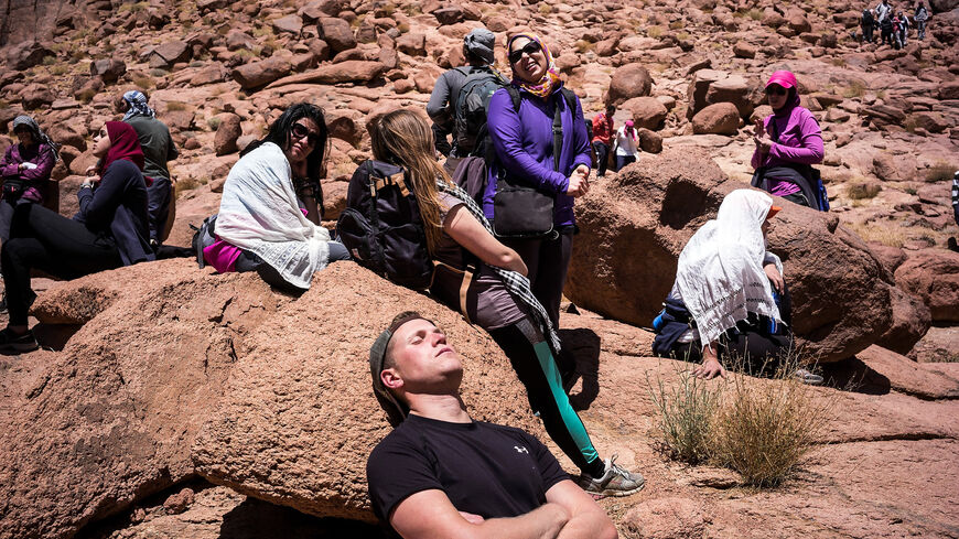 Bedouin guides lead tourists hiking through the mountains of south Sinai, near St. Catherine, Egypt, April 17, 2015.