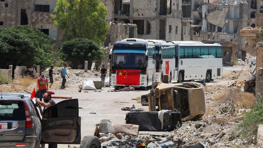 Filming in Hajar al-Aswad near the Syrian capital Damascus of a scene in "Home Operation",  produced by actor Jackie Chan and inspired by the evacuation of Chinese and foreign nationals in the early days of Yemen's civil war