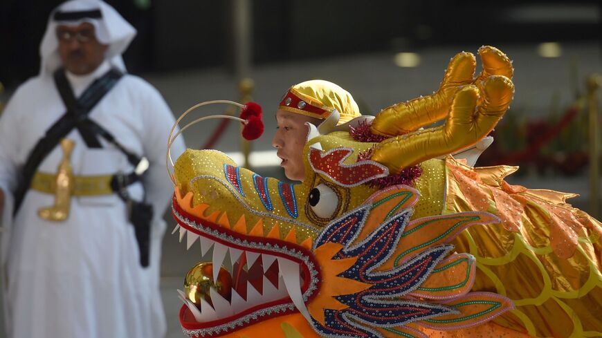 Chinese traditional dance teams perform during the inauguration ceremony of the Yanbu Aramco Sinopec Refining Company.