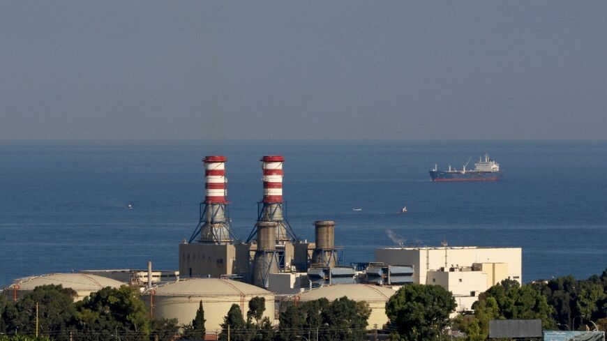 A tanker carrying fuel oil from Iraq is anchored off the Zahrani power plant near the southern Lebanese city of Sidon (Saida) on September 18, 2021