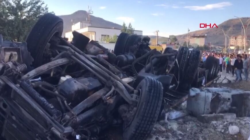 A video grab taken from AFP TV footage on August 20, 2022 shows a truck after a crash in the Derik district of Turkey's Mardin, which killed at least 19 people