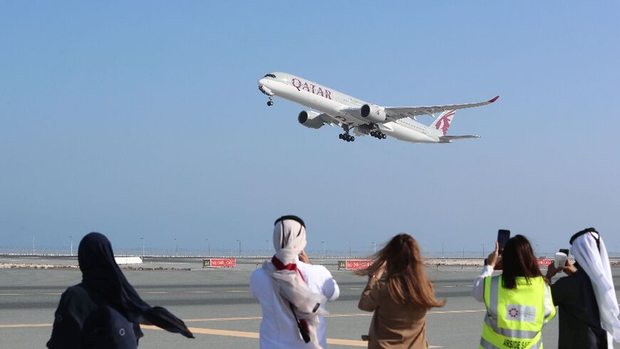 A Qatar Airways Airbus A350 airplane takes off from Hamad International Airport near the Qatari capital Doha