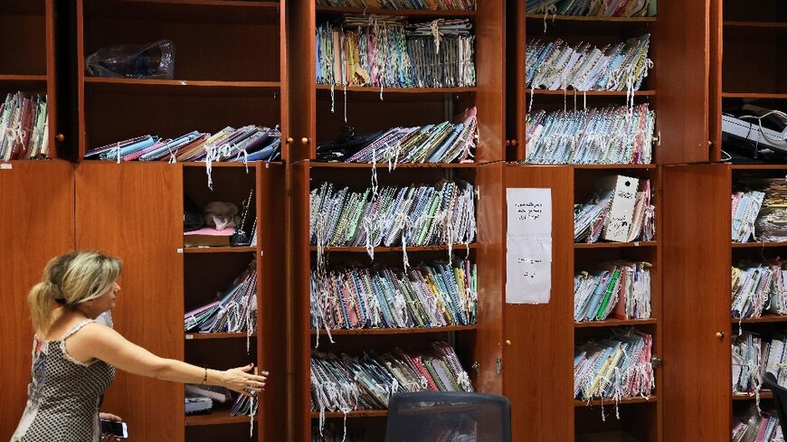 Piled files await being processed in Lebanon's Justice Palace in Beirut, in a picture from August 30, 2022