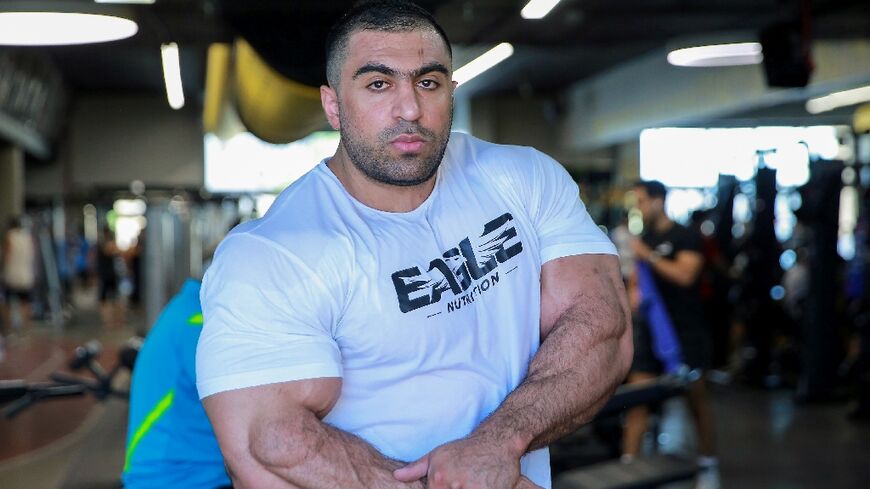 Jordanian Mohammad Nsour trains at a gym in the capital Amman 