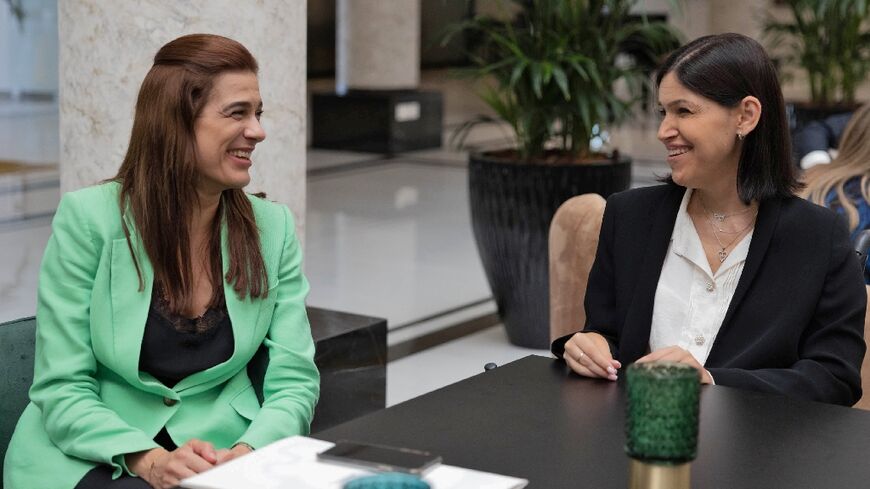 Cyprus Energy Minister Natasa Pilides, on the left, meets her Israeli counterpart Karine Elharrar in Nicosia on September 19, 2022