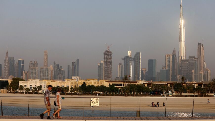 The iconic skyline of Dubai, a city which is perfectly poised to exploit the overspill of fans from tiny Qatar during football's first Winter World Cup