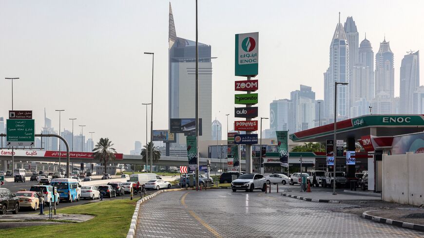 Vehicles queue to refuel at a petrol station in Dubai on June 30, 2022. (Photo by Giuseppe CACACE / AFP) (Photo by GIUSEPPE CACACE/AFP via Getty Images)