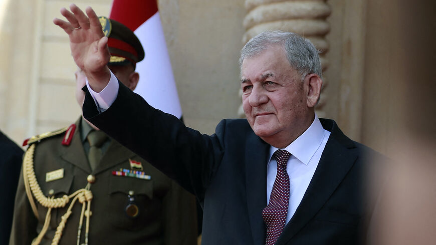 Iraq's newly-elected President Abdul Latif Rashid waves during his inauguration and handover ceremony at al-Salam Palace in the capital Baghdad on Oct. 17, 2022. 