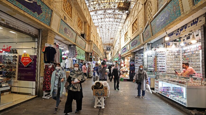 Iranian women shop at the Tajrish bazaar in the capital Tehran