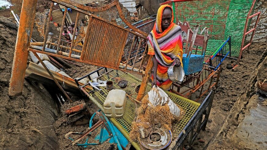 Blue Nile is awash with guns and is still struggling to rebuild after decades of civil war, with over 300 people killed in recent months: this photograph from August shows the aftermath of an attack