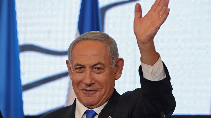 Veteran Israeli leader and head of the Likud party Benjamin Netanyahu addresses supporters at campaign headquarters in Jerusalem early on November 2 after the end of voting for national elections