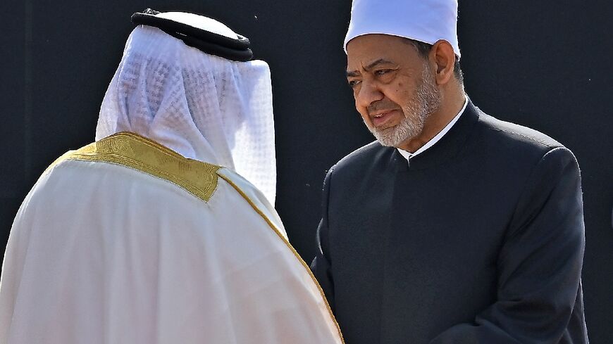 The grand imam of Egypt's Al-Azhar mosque, Sheikh Ahmed al-Tayeb (R), was welcomed by Bahrain's King Hamad bin Isa al-Khalifa (L) 