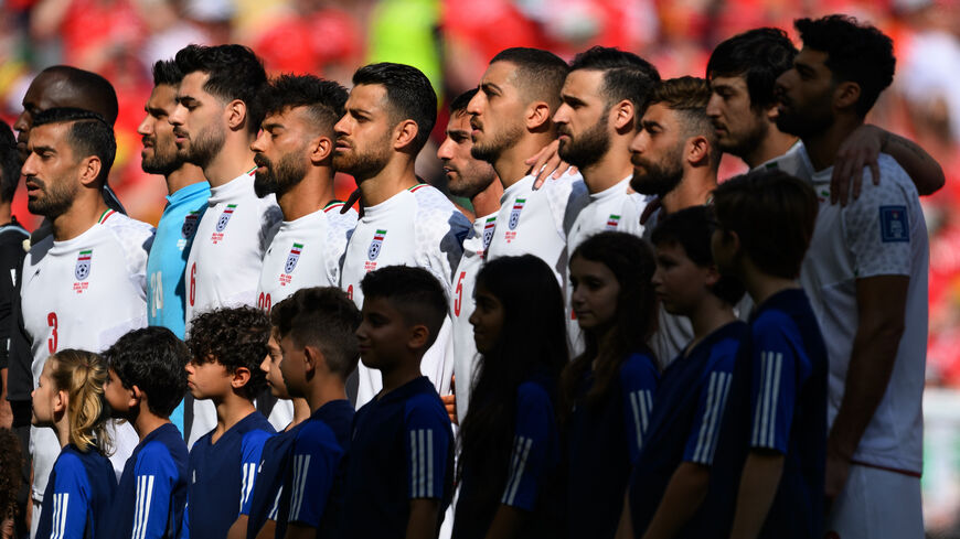 The players of Iran line up for the national anthem prior to the FIFA World Cup Qatar 2022.
