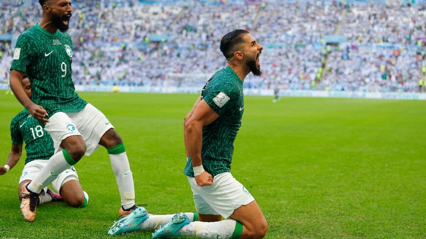 Saudi Arabia's Saleh al-Shehri celebrates after scoring his team's first goal, on the way to a 2-1 victory over Argentina that stunned the world