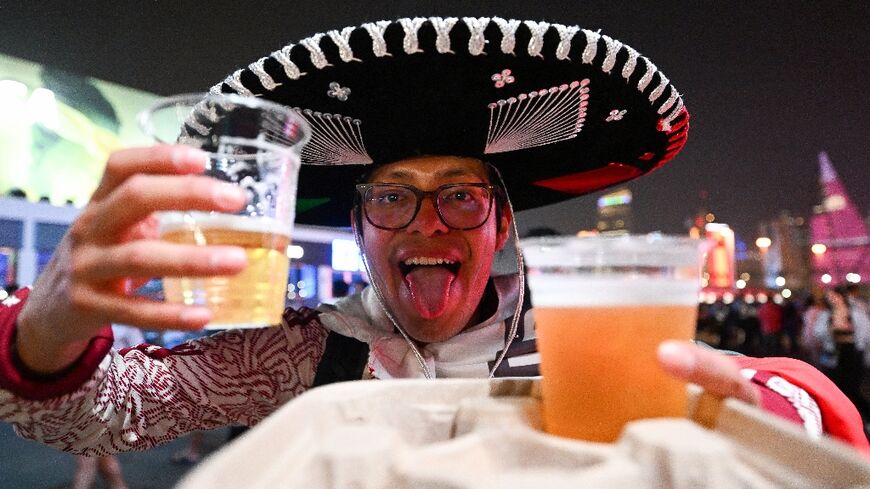 Some thirsty World Cup fans waited an hour for the Budweiser stand to open at the official fan zone