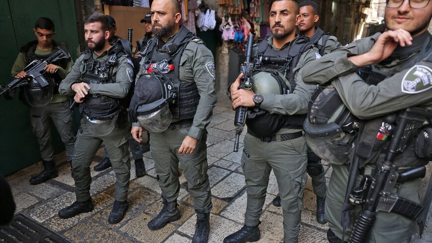 Israeli police deploy to the alleyway in Jerusalem's Old City where a man was shot dead after reportedly stabbing one of their colleagues