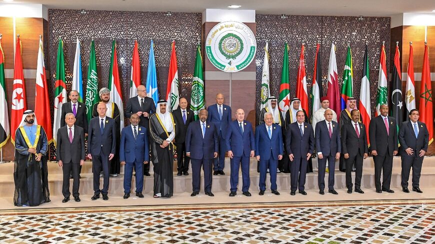 Arab leaders pose for a group photo in the Algerian capital for the first Arab League summit since a string of normalisation deals with Israel that have divided the region