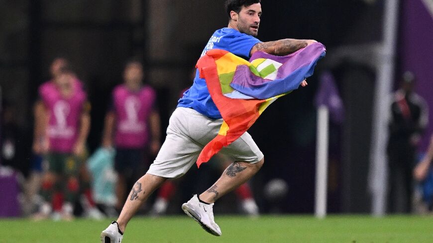 Mario Ferri, 35, who calls himself 'The Falcon', interrupted the Portugal-Uruguay game