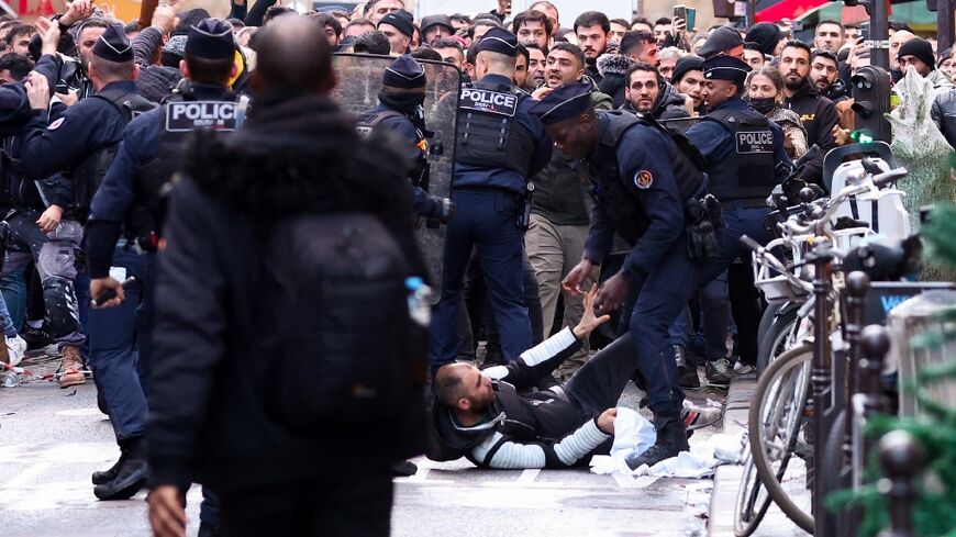 Demonstrators threw objects at police in response, set rubbish bins on fire and erected barricades