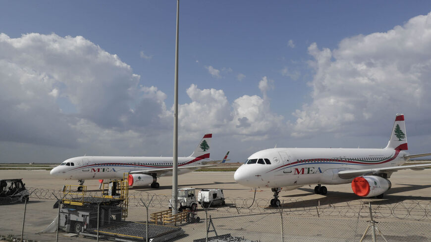 Lebanon's Middle East Airlines planes are parked on the tarmac of Beirut International Airport amid restrictions to combat the coronavirus across the country, Lebanon, March 19, 2020.