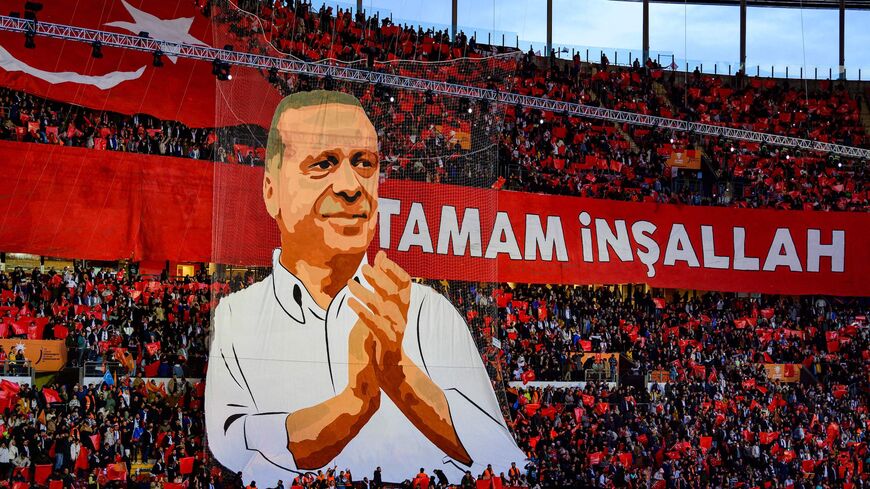 AKP party supporters attend the "Unity, Will, Victory" rally at the Galatasaray's Nef Stadium in Istanbul on Nov. 27, 2022, six months ahead of Turkey's next presidential elections.