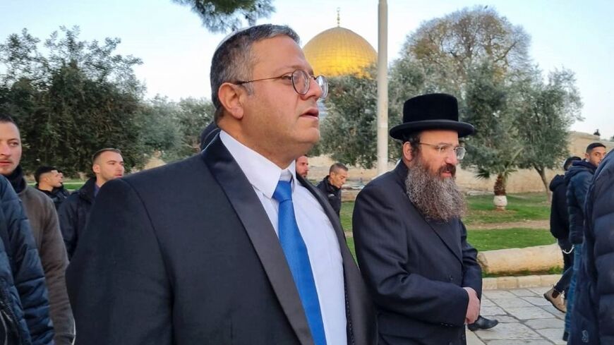 Israeli cabinet minister Itamar Ben-Gvir walks through the courtyard of Jerusalem's Al-Aqsa mosque compound, which Jews know as the Temple Mount 