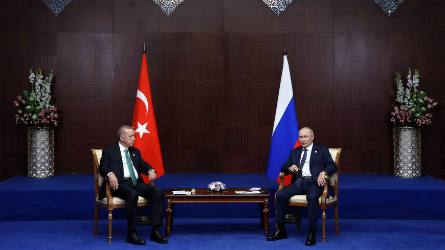Russian President Vladimir Putin (R) meets with Turkish President Recep Tayyip Erdogan on the sidelines of the Sixth Summit of the Conference on Interaction and Confidence Building Measures in Asia, Astana, Kazakhstan, Oct. 13, 2022.