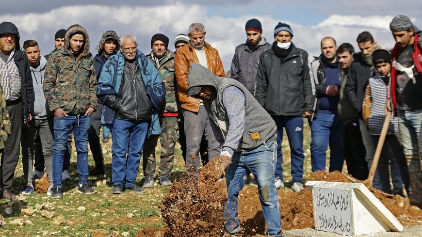 Ice-cream trucks and minivans transported bodies to Aleppo's new cemetery, where they were hastily buried