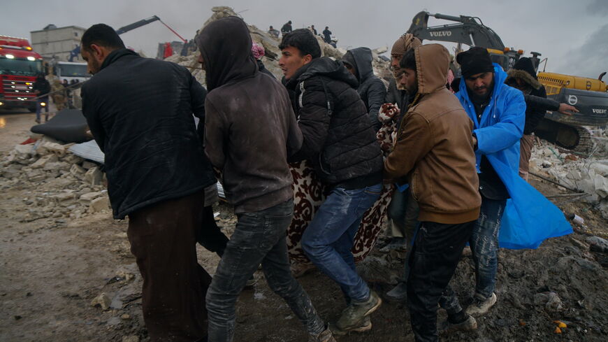 The village of Bibsna, located on the Syrian-Turkish border, was almost completely destroyed by the earthquake, and rescue teams are trying to recover the victims and treat the wounded, Feb. 6, 2023.