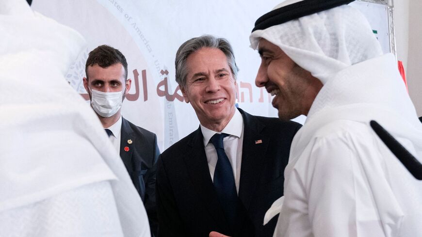 US Secretary of State Antony Blinken (2nd R) chats with United Arab Emirates' Foreign Minister Sheikh Abdullah bin Zayed Al Nahyan (R) in Sde Boker, Israel on March 28, 2022. 