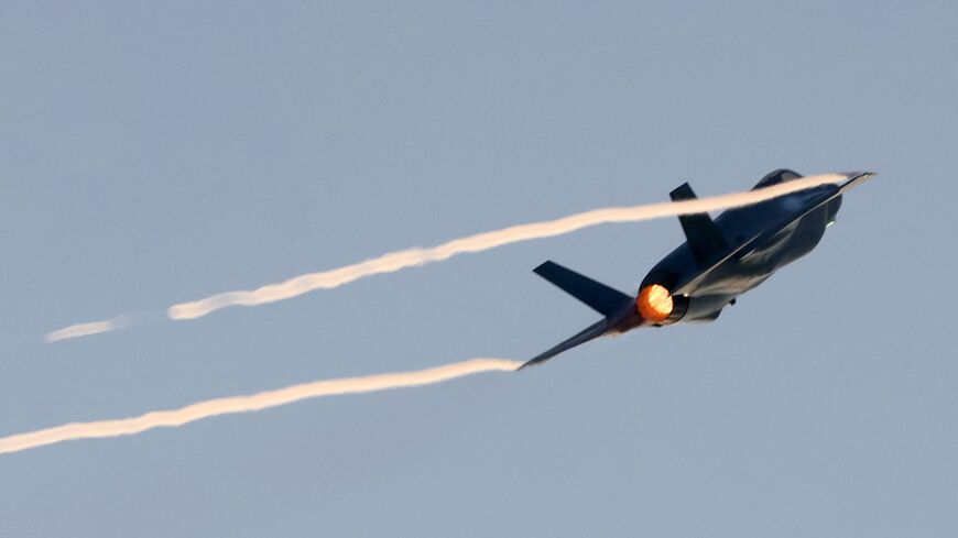 An Israeli Air Force F-35 Lightning II fighter jet performs during a graduation ceremony of Israeli Air Force pilots, at the Hatzerim base in the Negev desert, near the southern city of Beer Sheva, on December 28, 2022. (Photo by JACK GUEZ / AFP) (Photo by JACK GUEZ/AFP via Getty Images)