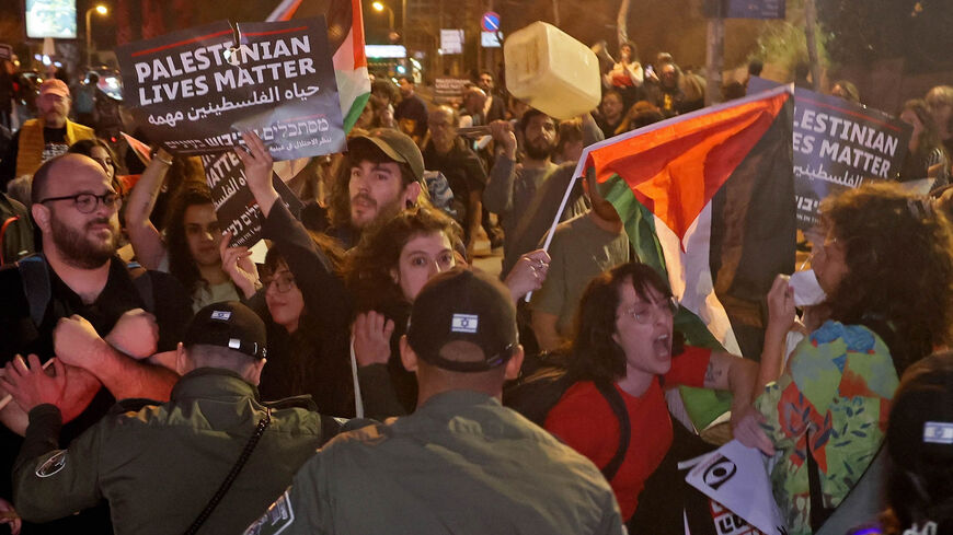 Protesters clash with Israeli security forces during a demonstration against Israeli settler attacks on the Palestinian West Bank village of Huwara, Tel Aviv, Feb. 27, 2023.